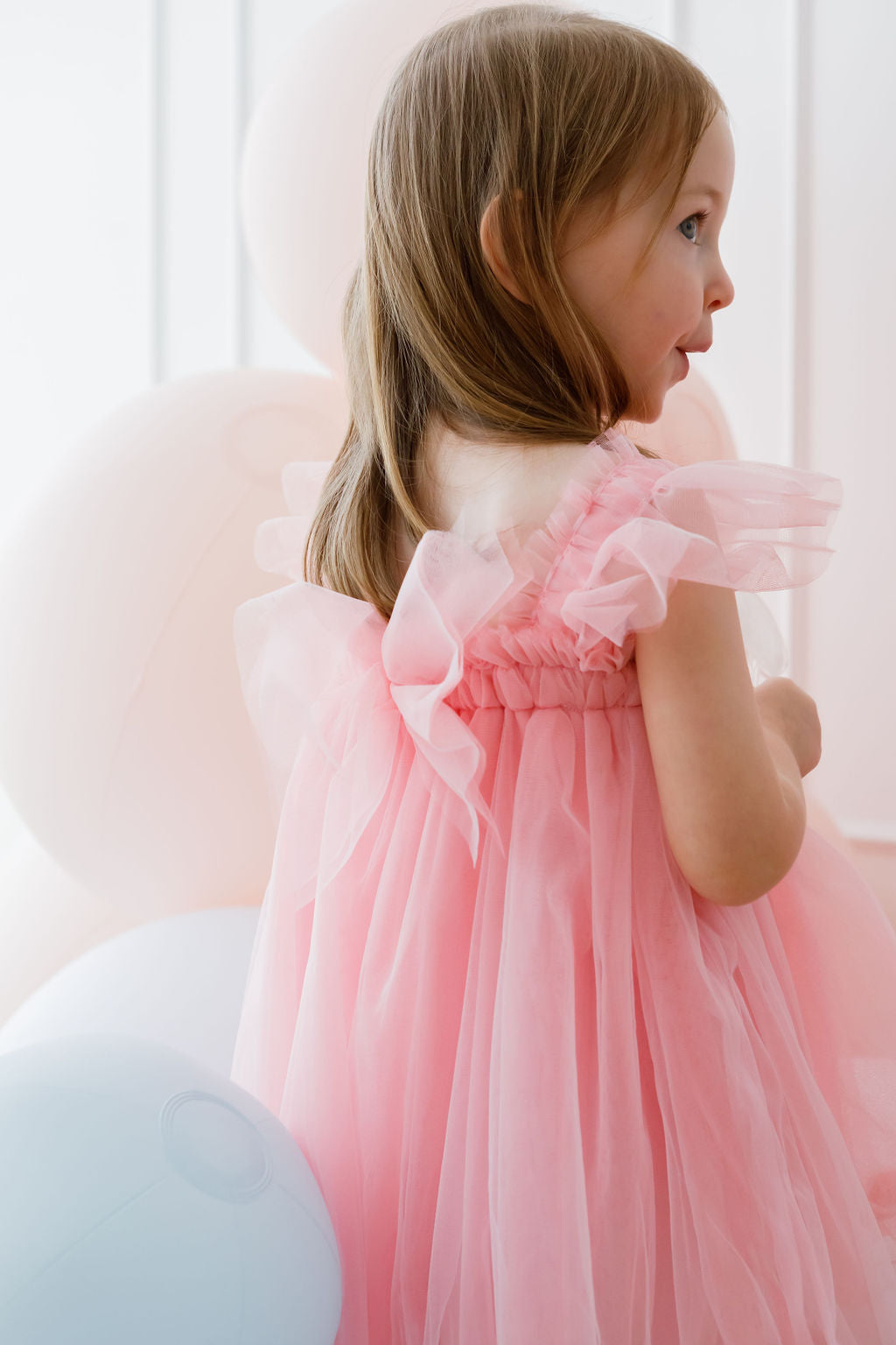 Hidden Pom Pom and star detail fairy dress